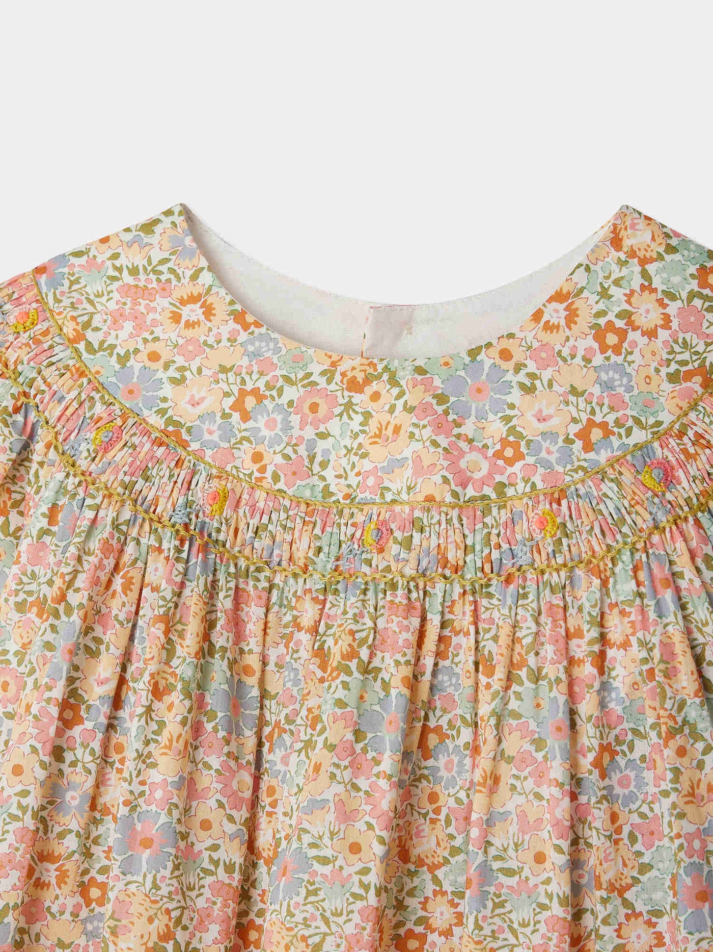 Blusa smock Eliotine realizzata con tessuti Liberty